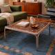 Vintage square coffee table with chrome legs and small tiled squares.