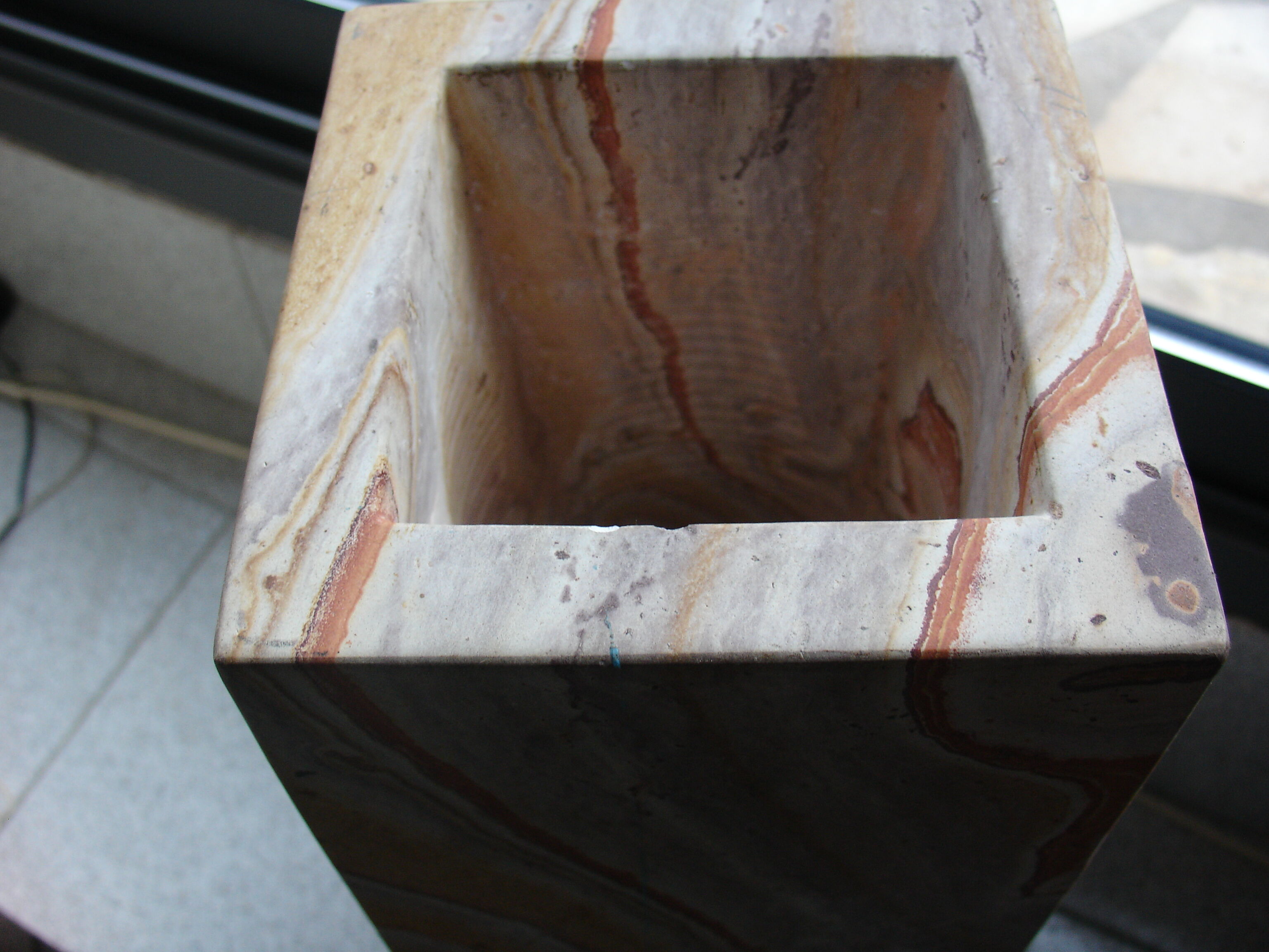 Floor vase in serpentine marble carved from a single block