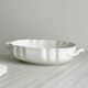 White fine porcelain soup tureen with relief decoration.
