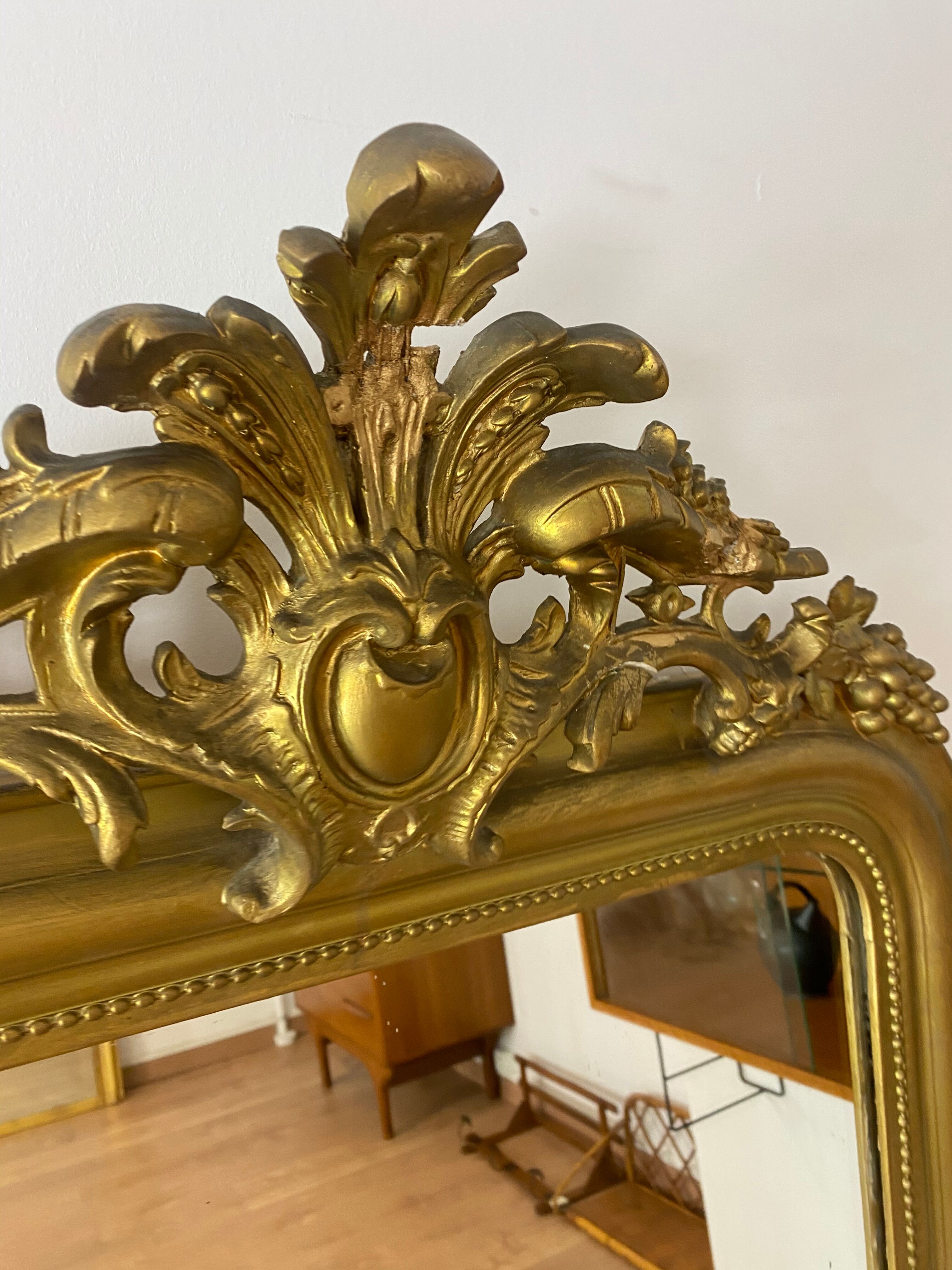 Large mirror with pediment XVIII eme gilded  86x150cm