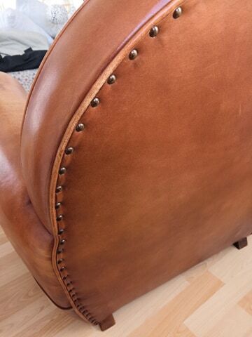 Tawny vintage leather club chair