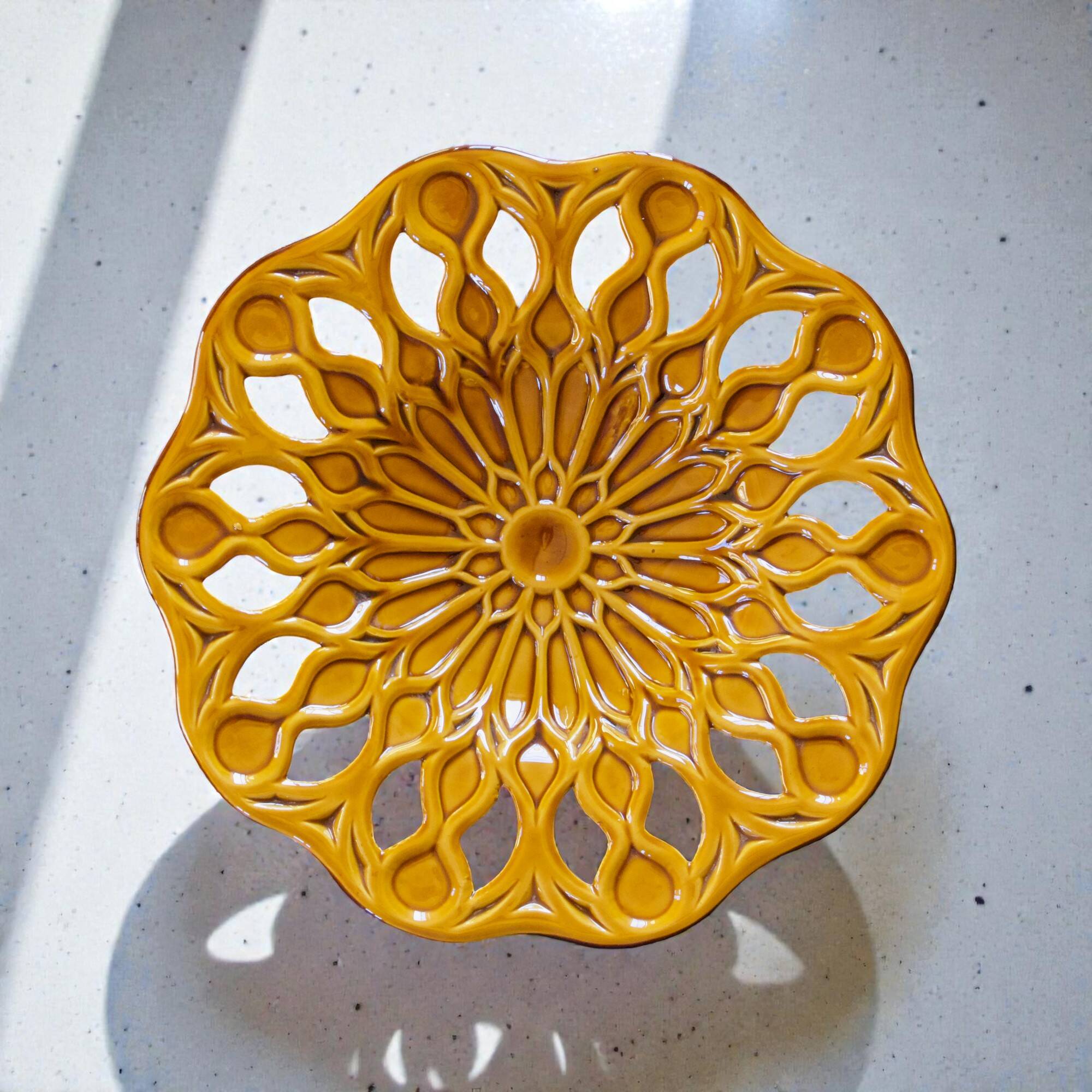 Large openwork majolica fruit bowl in earthenware.