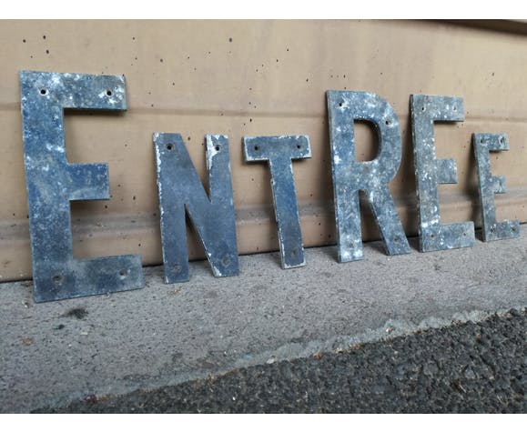 Entry into letters metal vintage