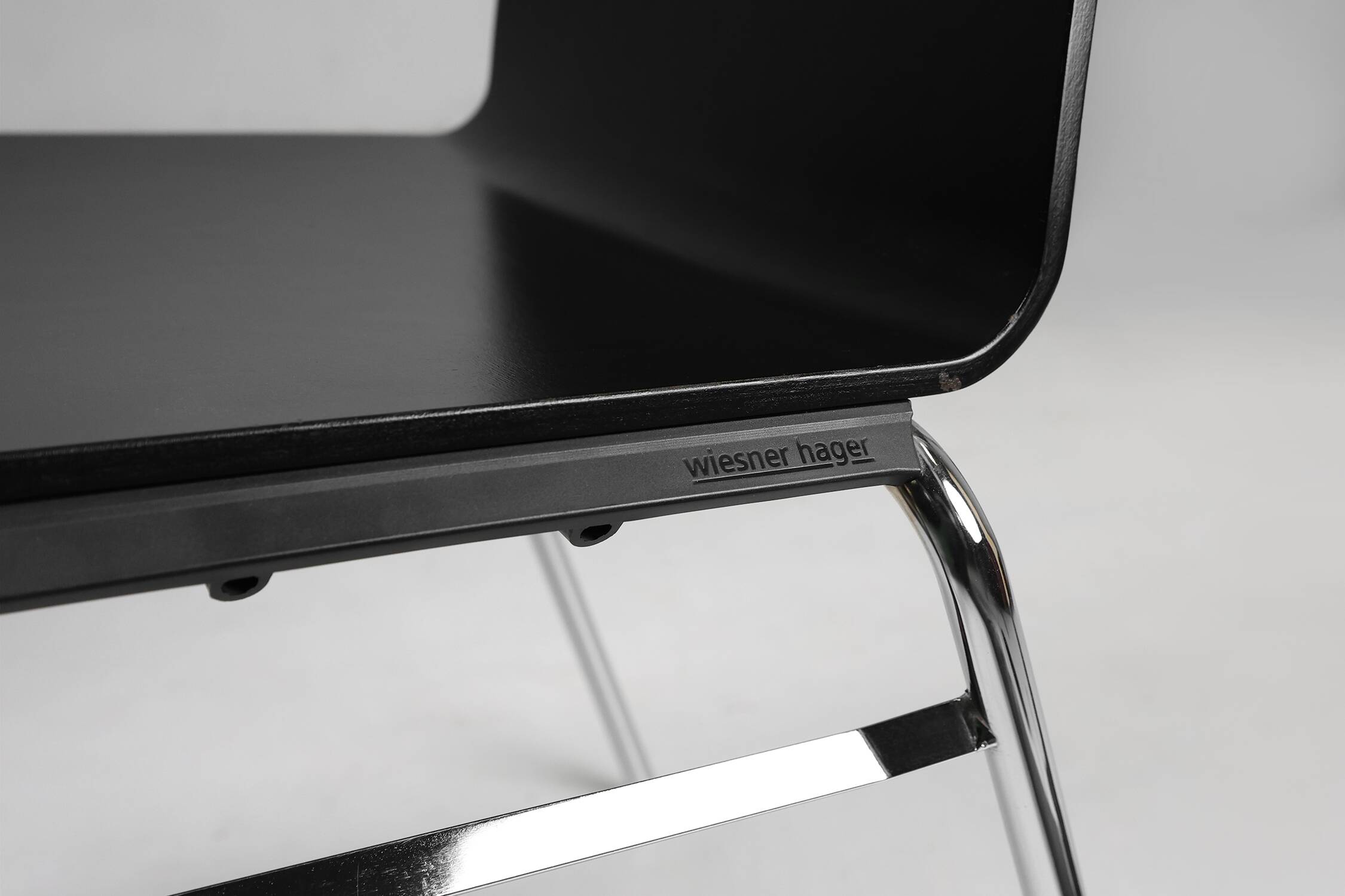 21th Century black design chair with wooden seat, Belgium