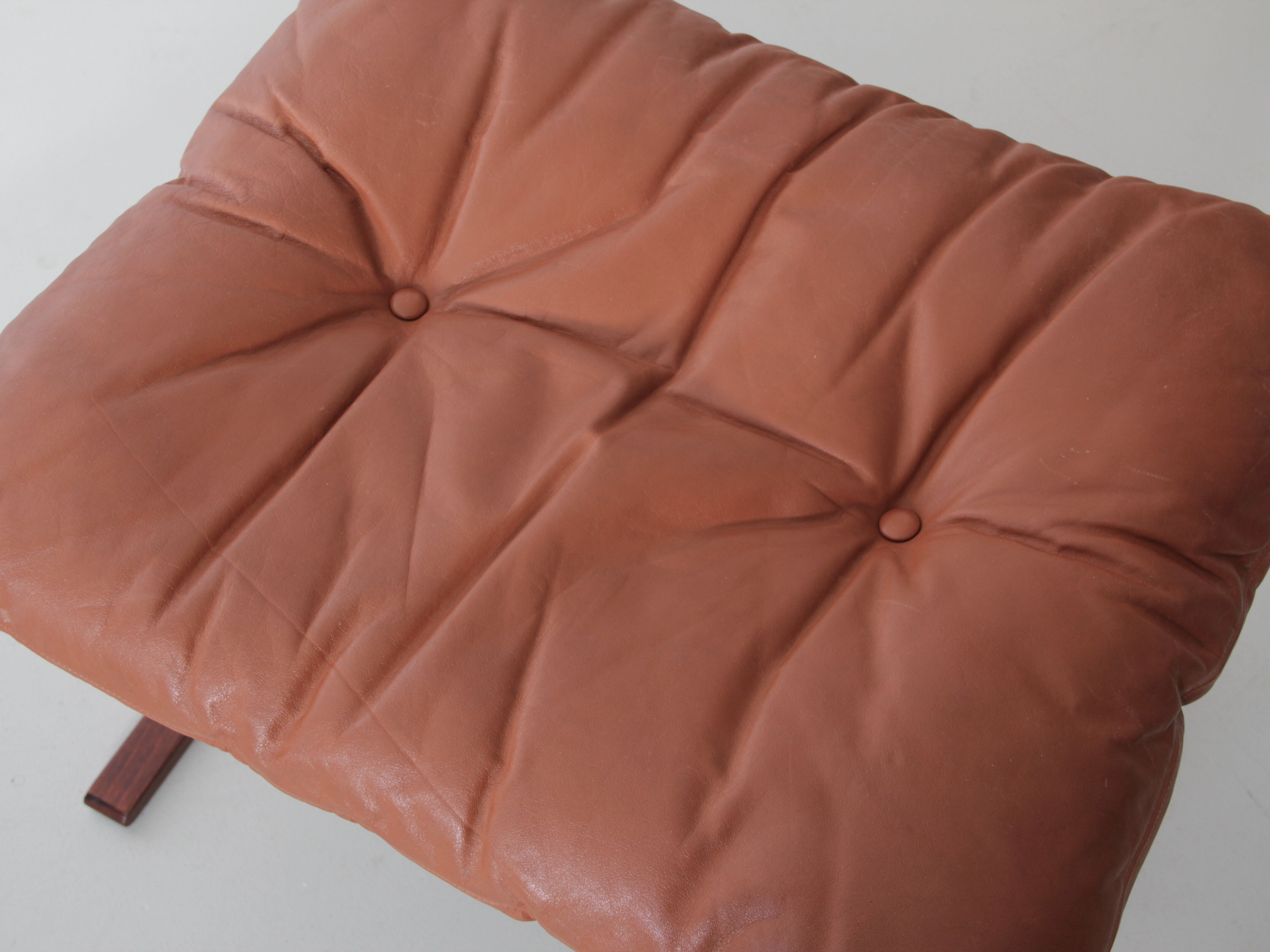 Scandinavian chair model Siesta, high back and foot rests