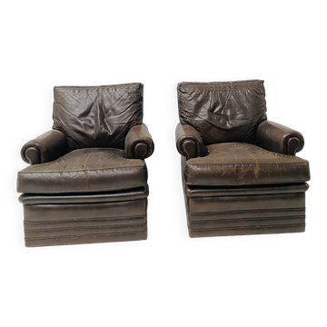 Pair of vintage brown leather armchairs from the 1970s.
