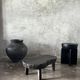 Small old Asian wooden coffee table in Japanese style, kidney-shaped top