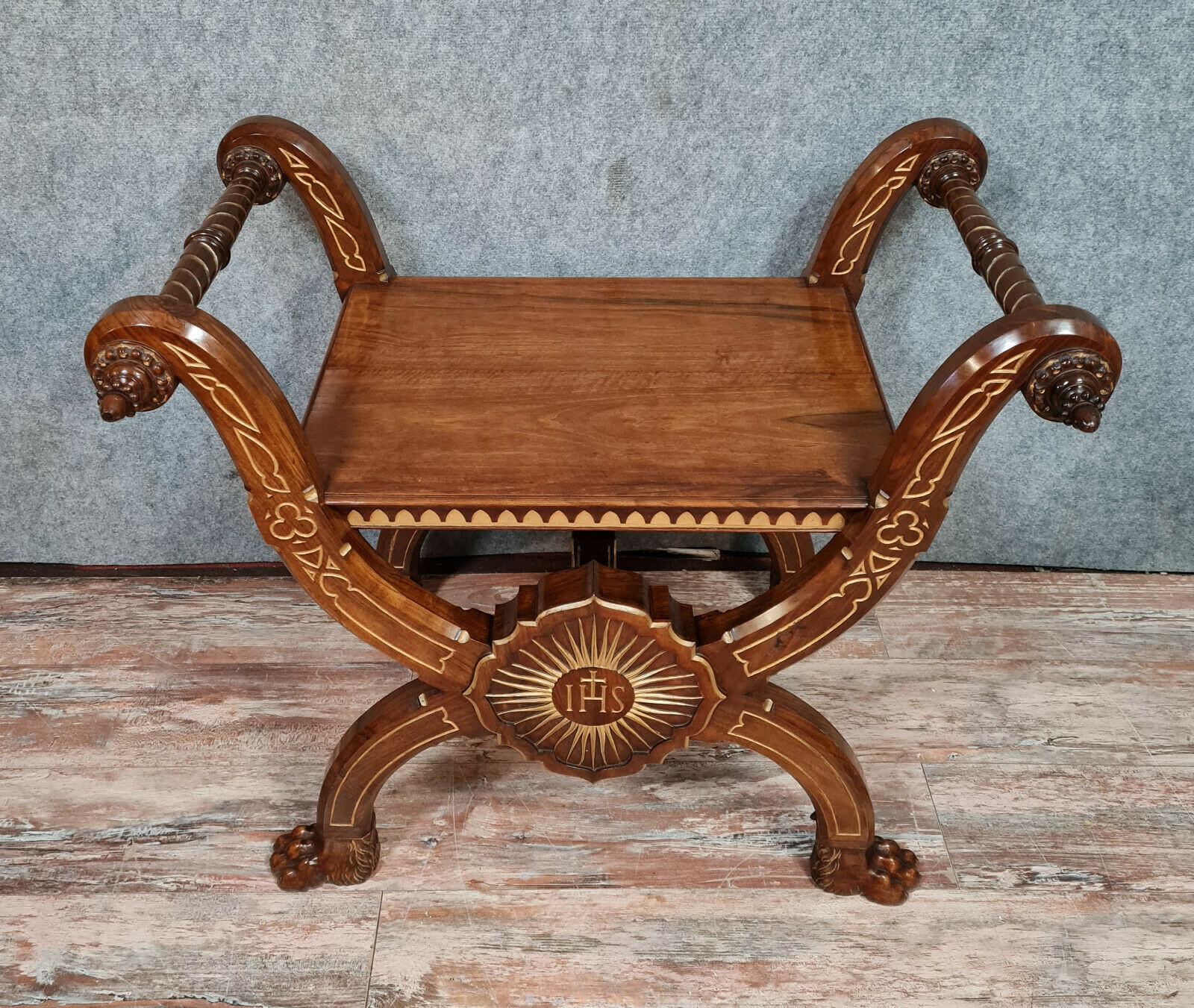 Bishop's curule armchair in solid walnut and gilding highlights with religious symbols