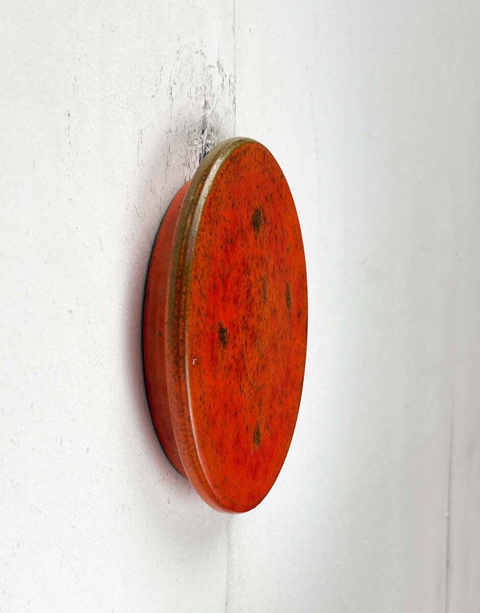 Mid-century modern Danish studio pottery, orange wall coat rack by Signe Boesen Northroup, 1960s.