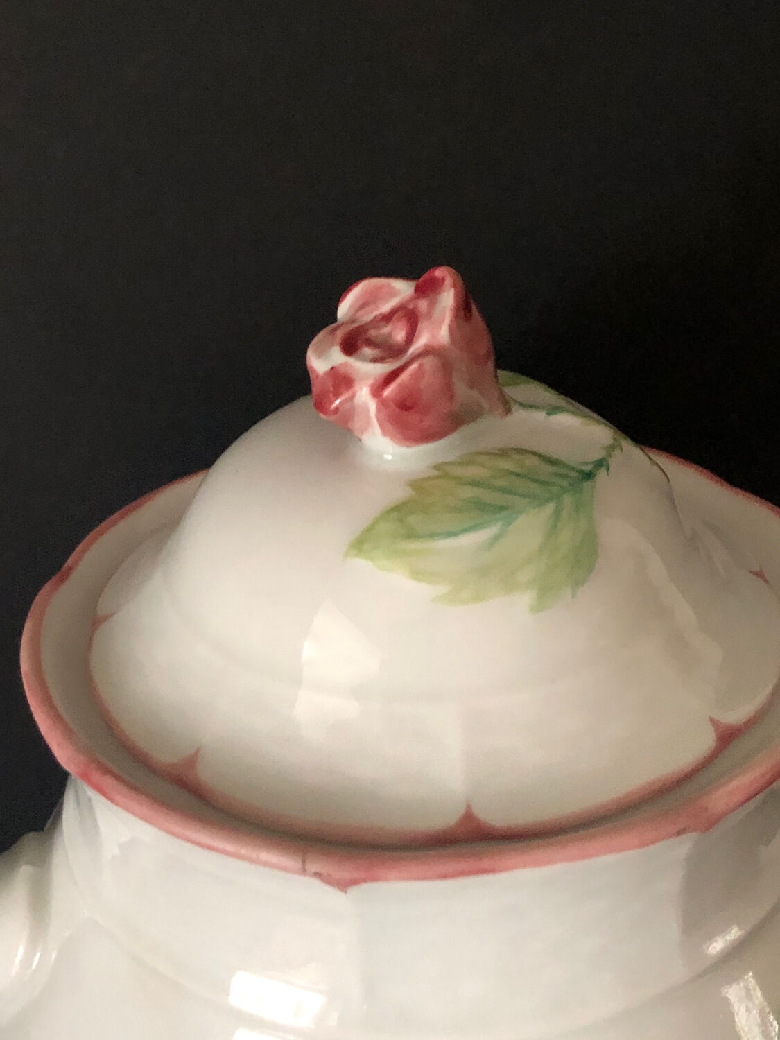 Old white and pink teapot