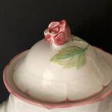 Old white and pink teapot