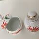 Y. Ginther porcelain jar and toilet jar