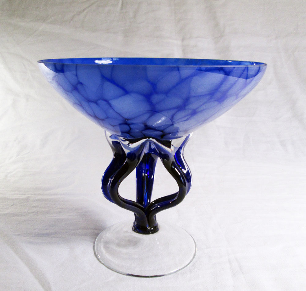 Blue glass cup on foot