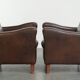 Sturdy set of vintage sheepskin armchairs in a beautiful dark colour
