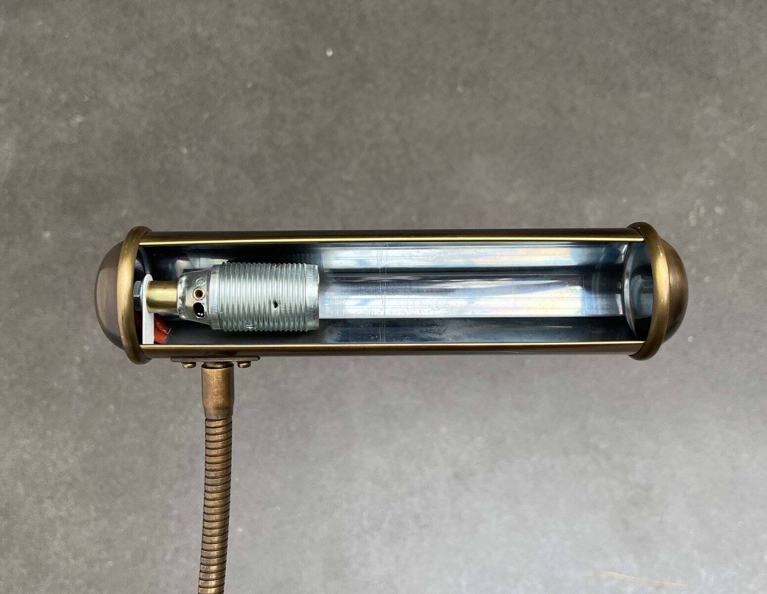 Vintage German brass patinated wall lamp with a gooseneck design by Honsel, 1970s.