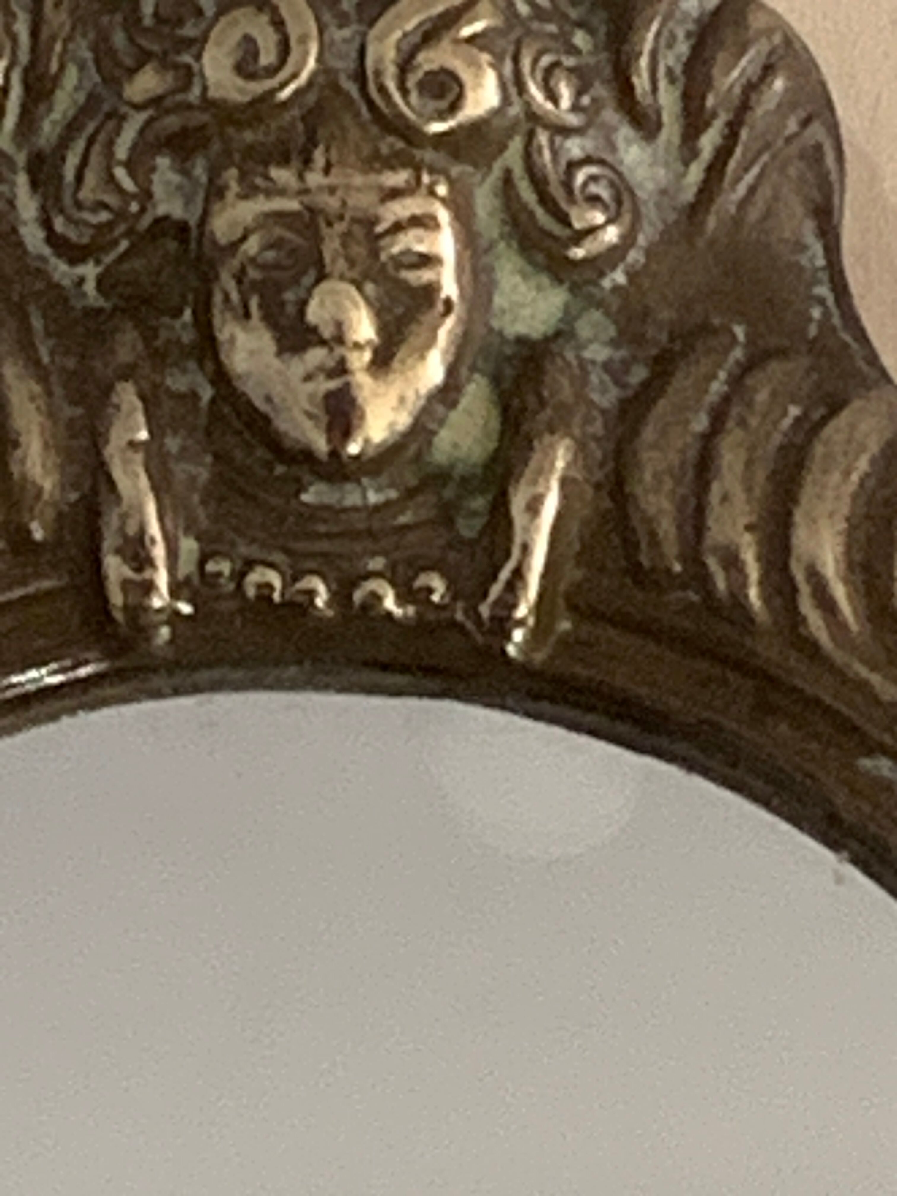 Bronze hand-facing mirror, early twentieth century, Louis XV style, 29 x 13 cm