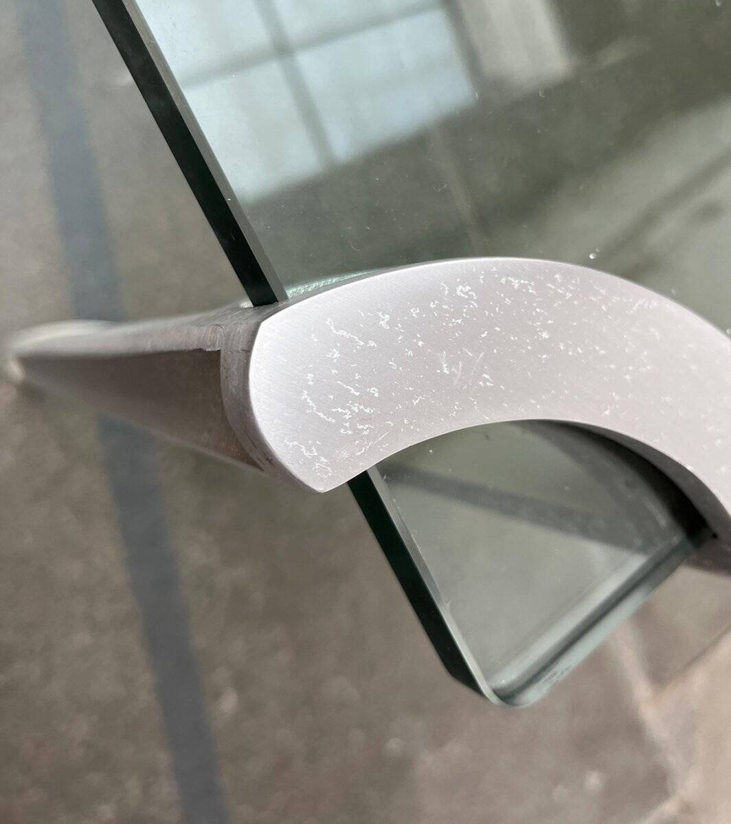 Vintage Space Age coffee table in glass and aluminium attributed to Peter Ghyczy, 1970s.