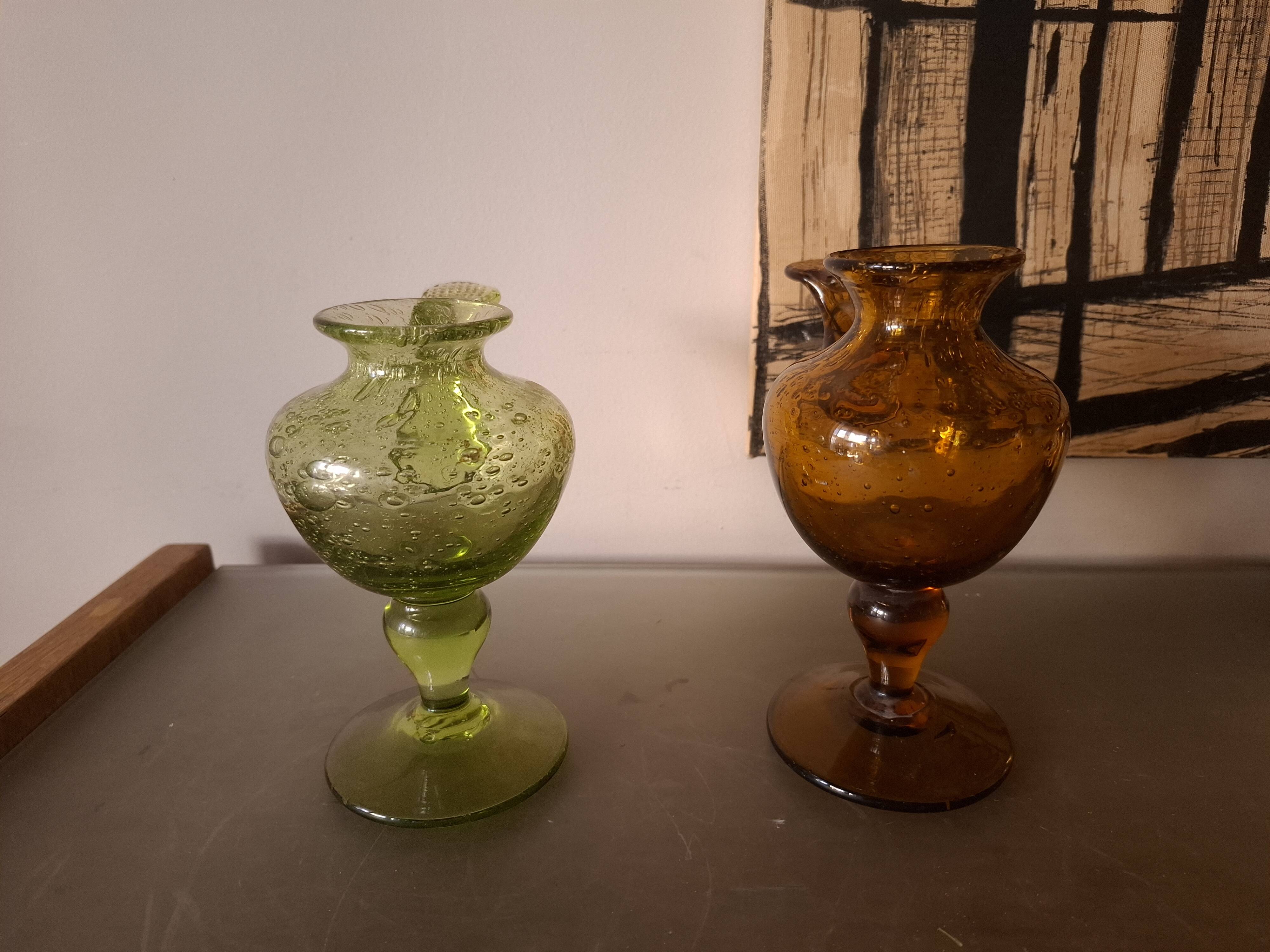 Two biot blown glass candle holders