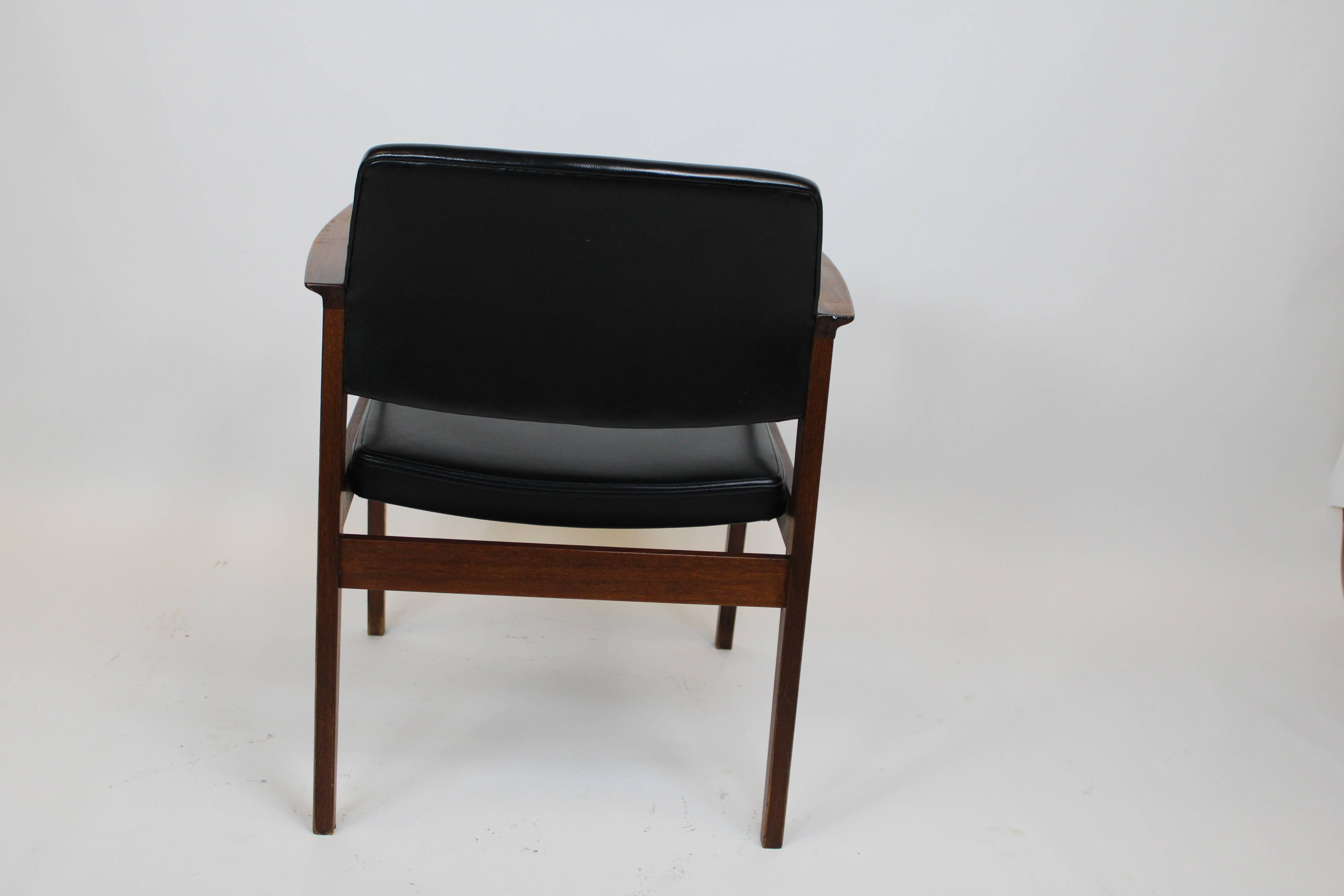 Vintage armchair 1960 black imitation leather and oak frame germany