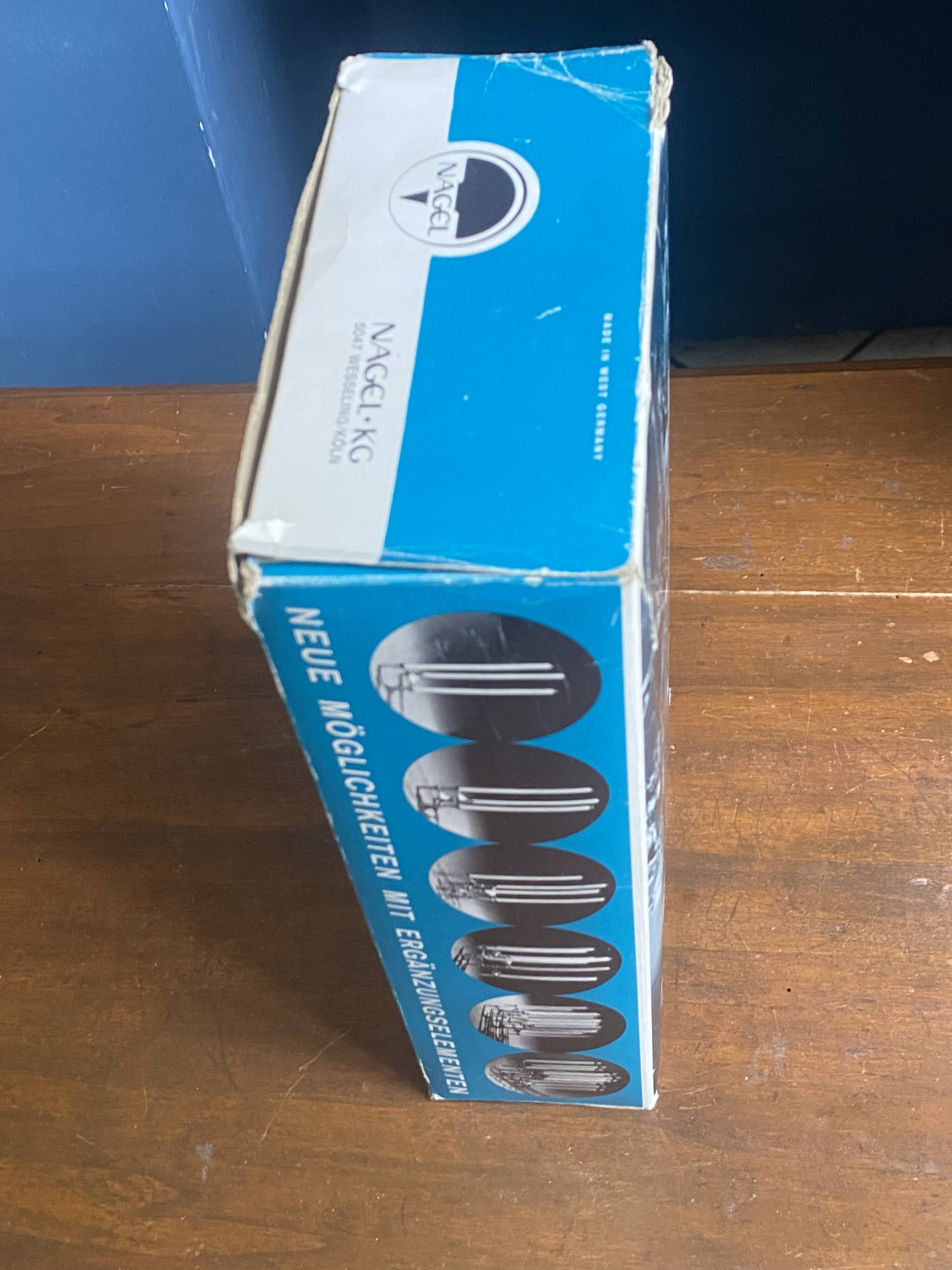 Set of 3 S22 candle holders and 9 vintage 1970 NAGEL modular candles in box.