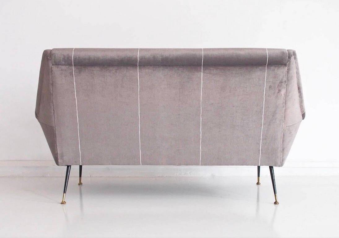 Italian velvet sofa in grey with black lacquered brass legs.