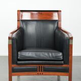 Black leather and wooden Art Deco design armchair