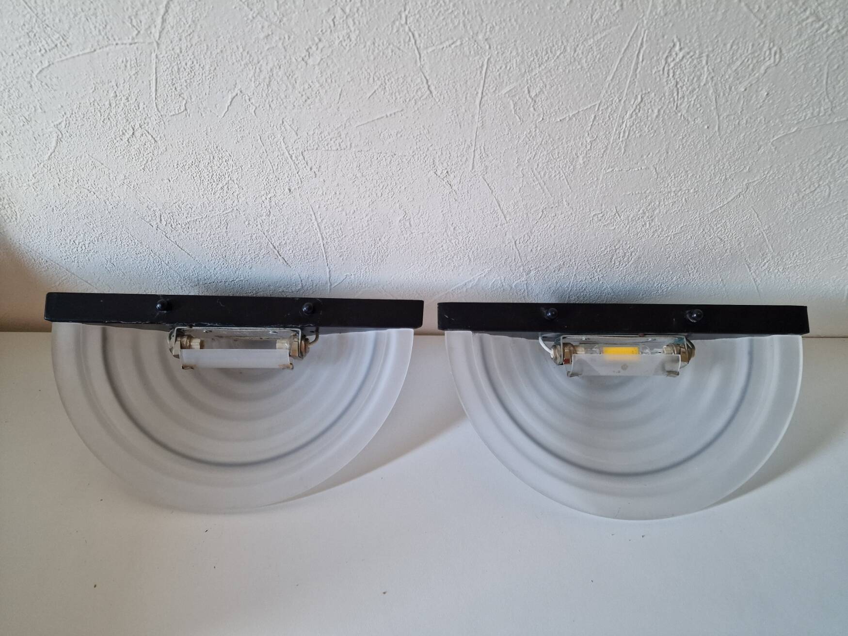 Pair of Italian design wall sconces in glass, art deco style.