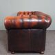 Chesterfield sofa in patinated orange leather, 2.5 seats