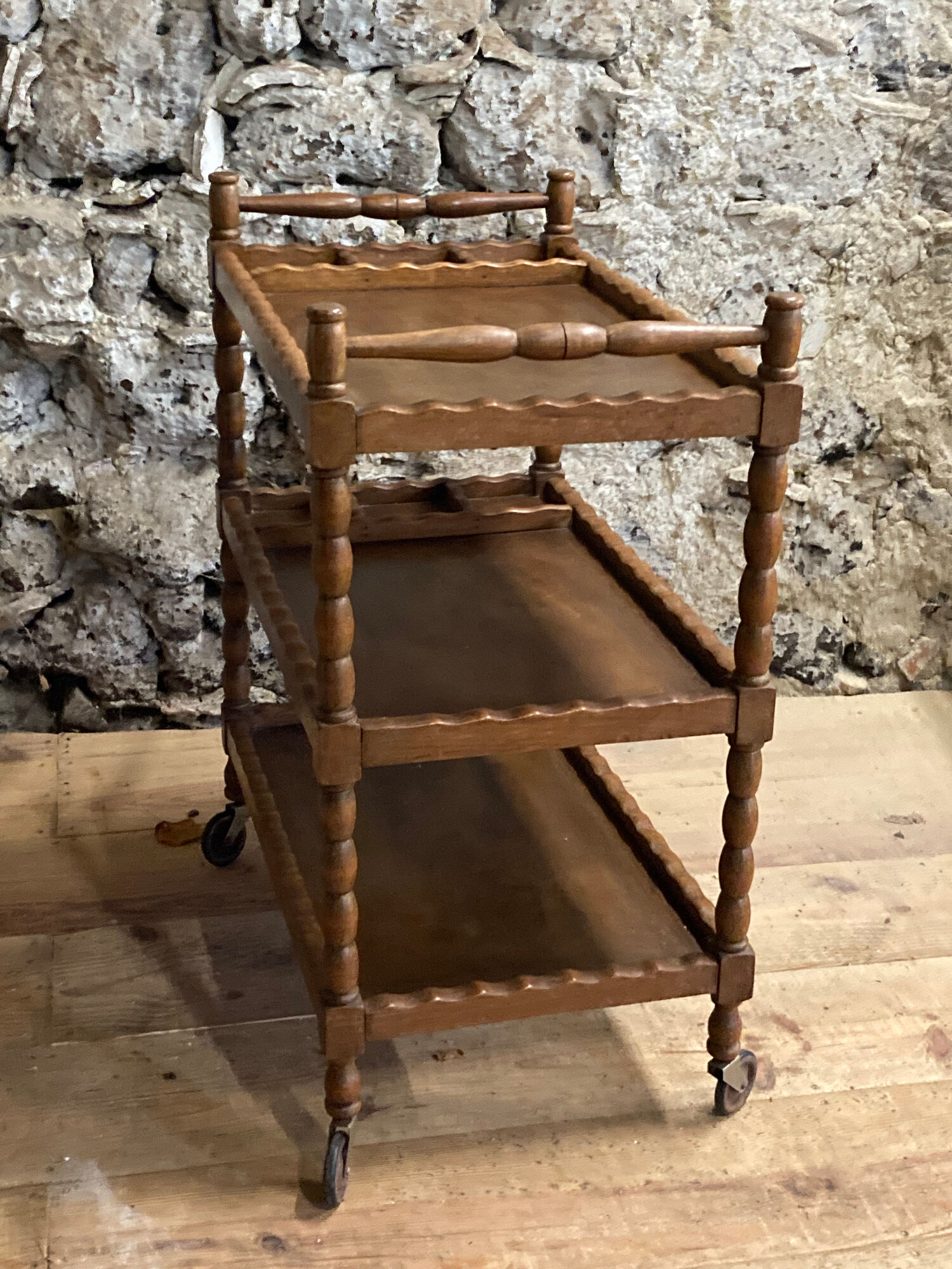 Wooden service turned on old wheels with bottle holder