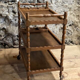 Wooden service turned on old wheels with bottle holder