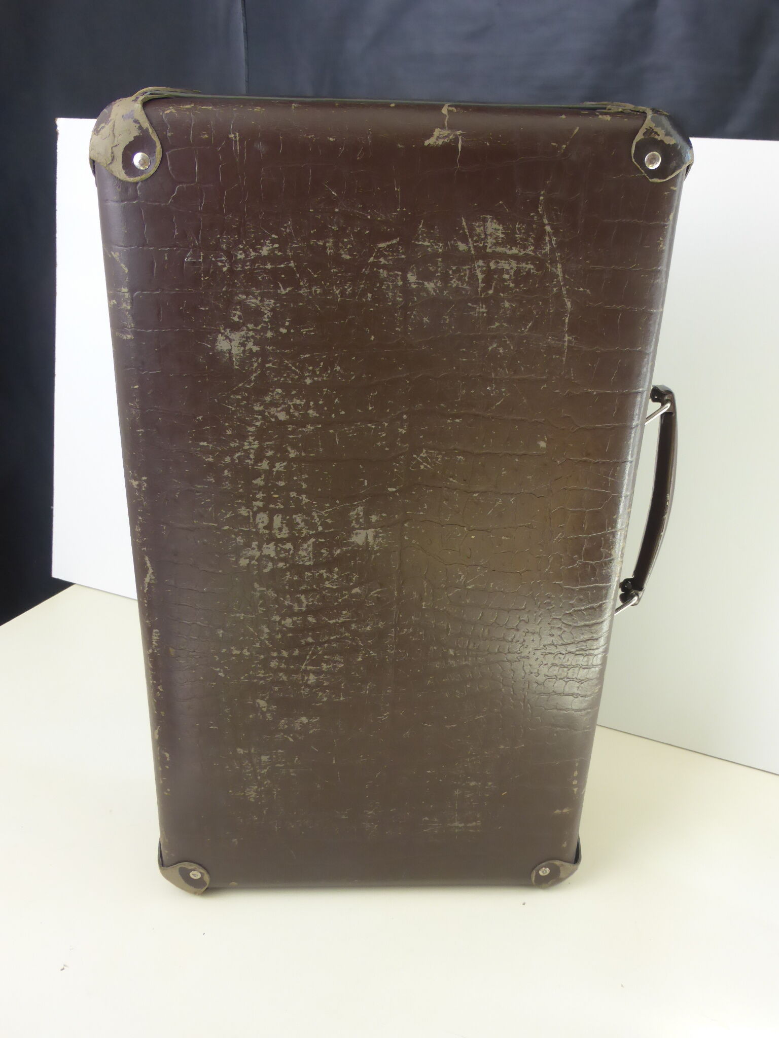 Old brown cardboard suitcase imitating the croco 50s/60s