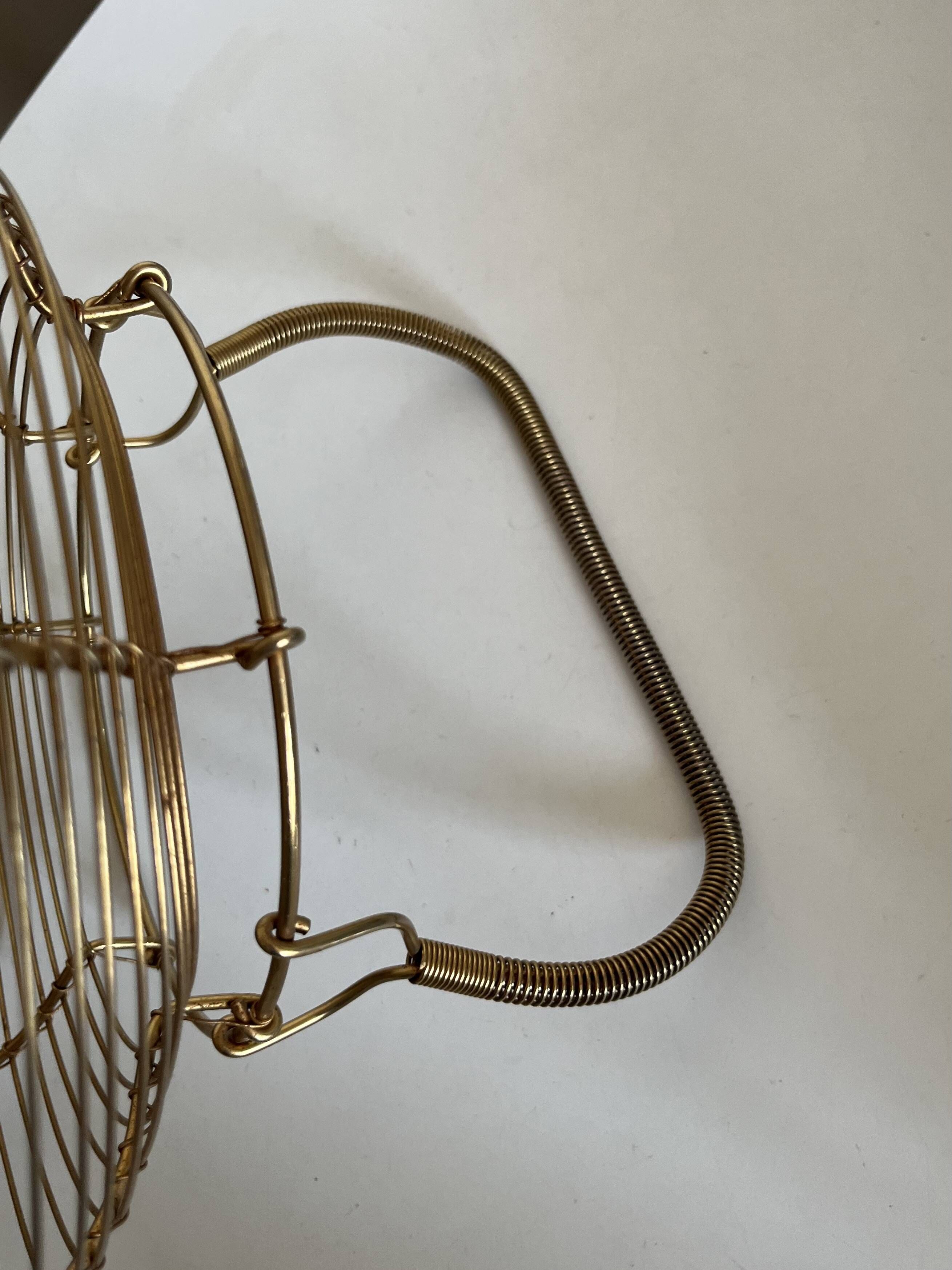 Golden metal basket 1960