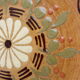 Assiette vintage aux motifs folkloriques et floraux