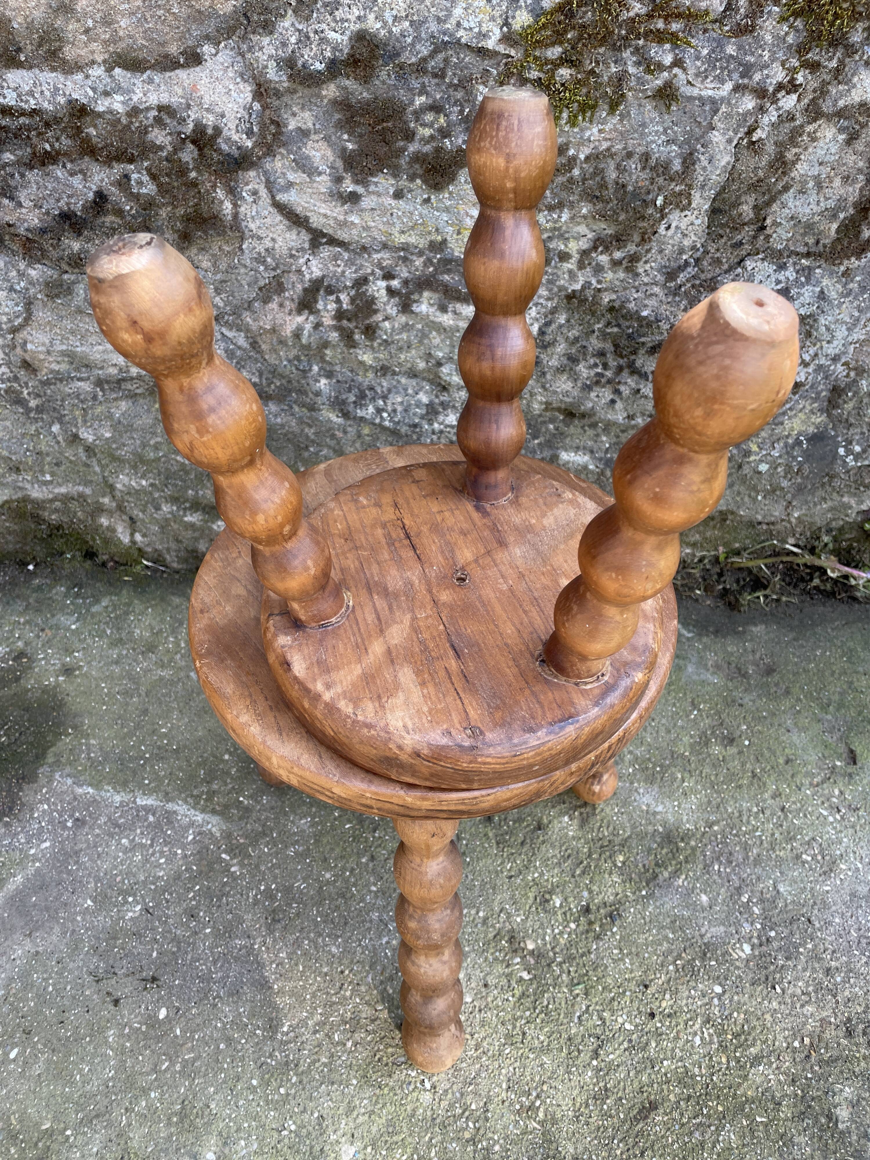 Set of two tripod Breton stools