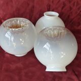 Series of 3 globes, vintage lampshades.