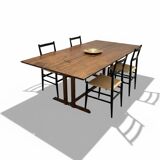 Exceptional dining table in solid walnut.