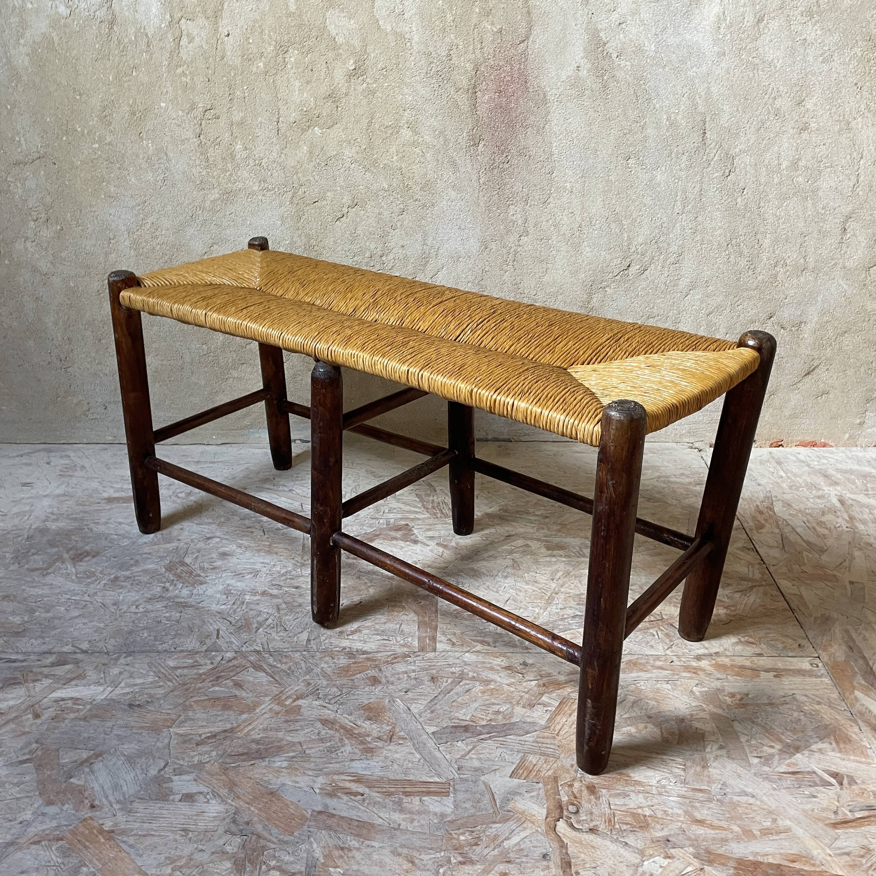 Wooden bench and rustic straw