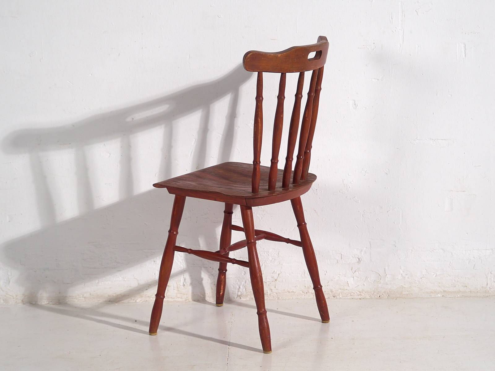 Antique red Windsor style chair (c.1920)