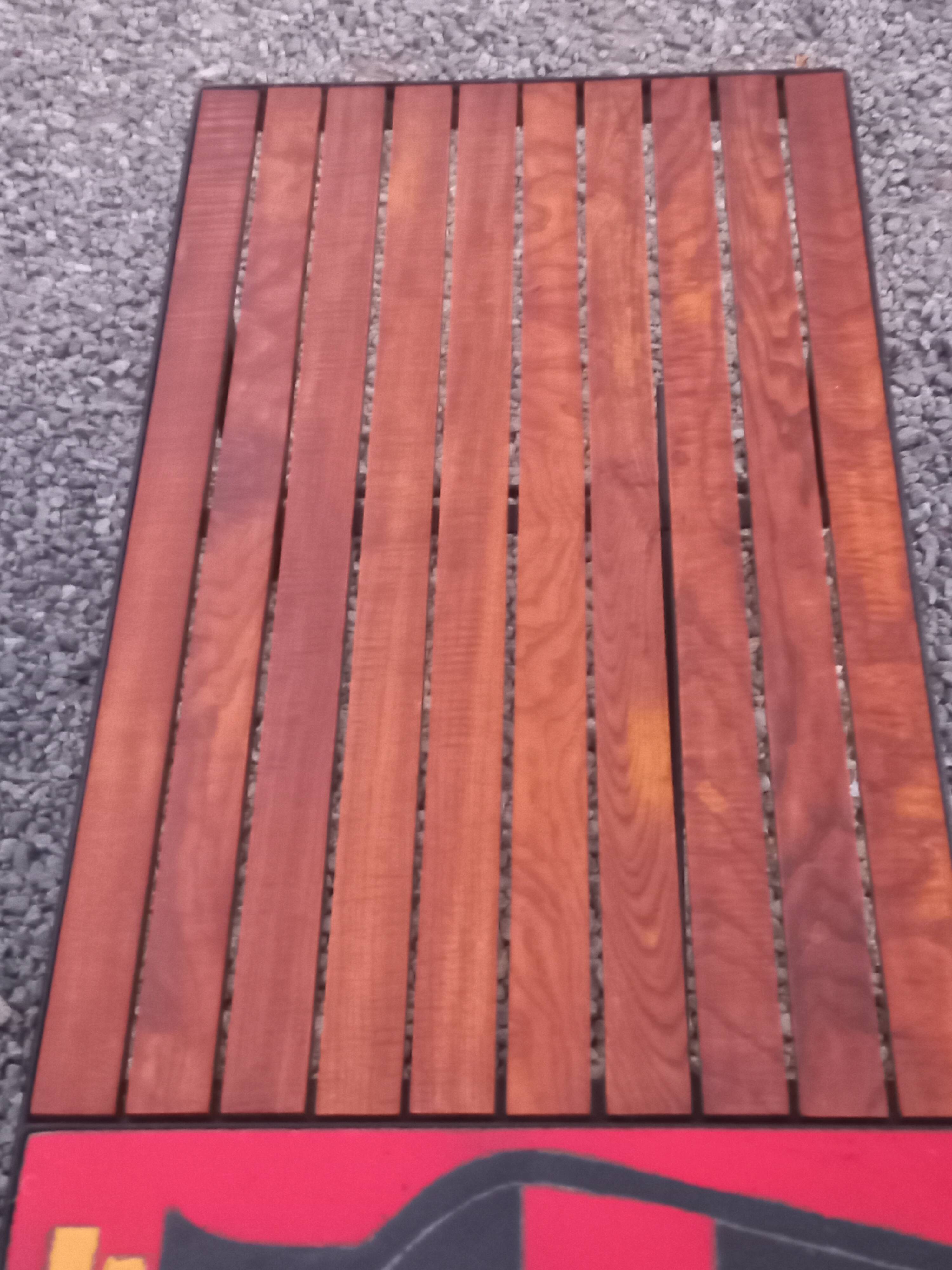 1970s design coffee table with ceramic and wood top, metal legs.