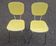 Pair of yellow formica chairs