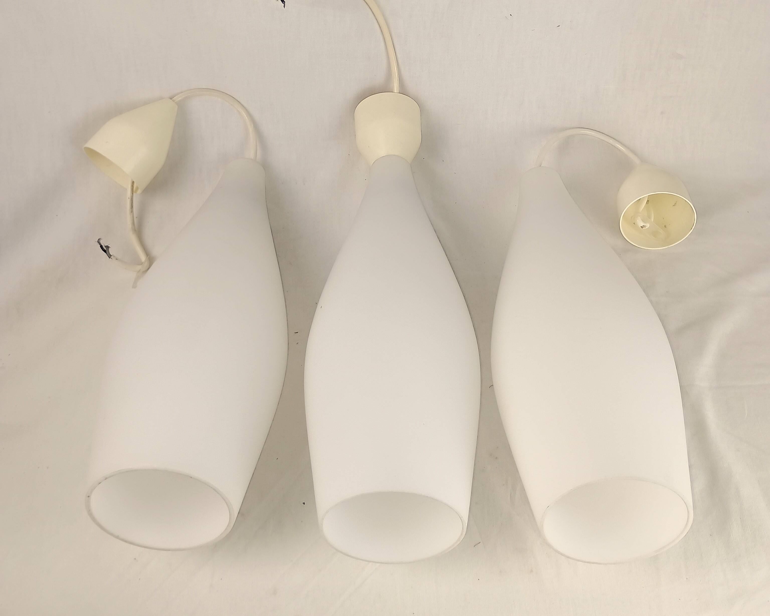Superb set of three Holmegaard white opaline glass pendant lights