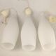 Superb set of three Holmegaard white opaline glass pendant lights