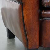 Large design armchair made of sheep leather