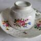 Antique Cup and Saucer in Porcelain with Hand-Painted Floral Decoration