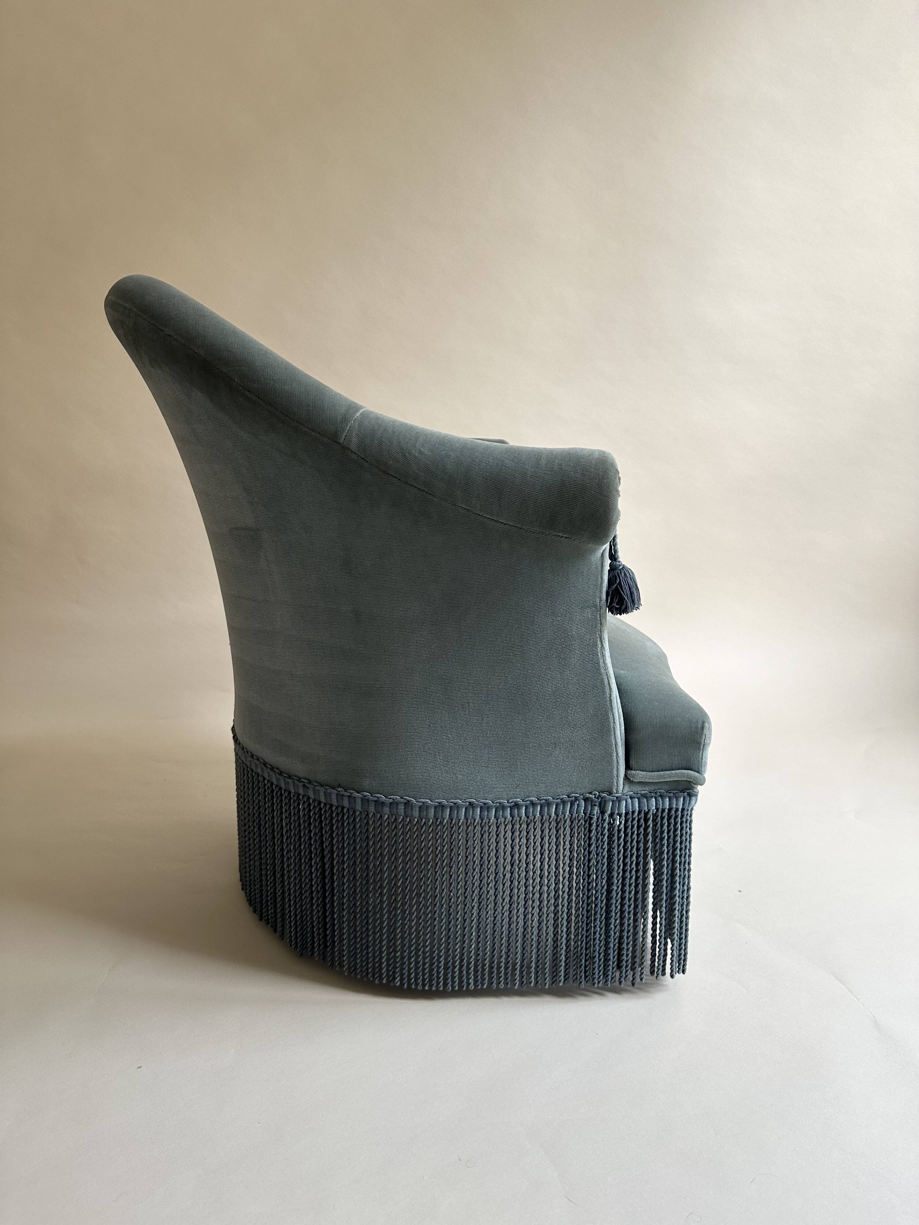 Blue velvet frog armchairs