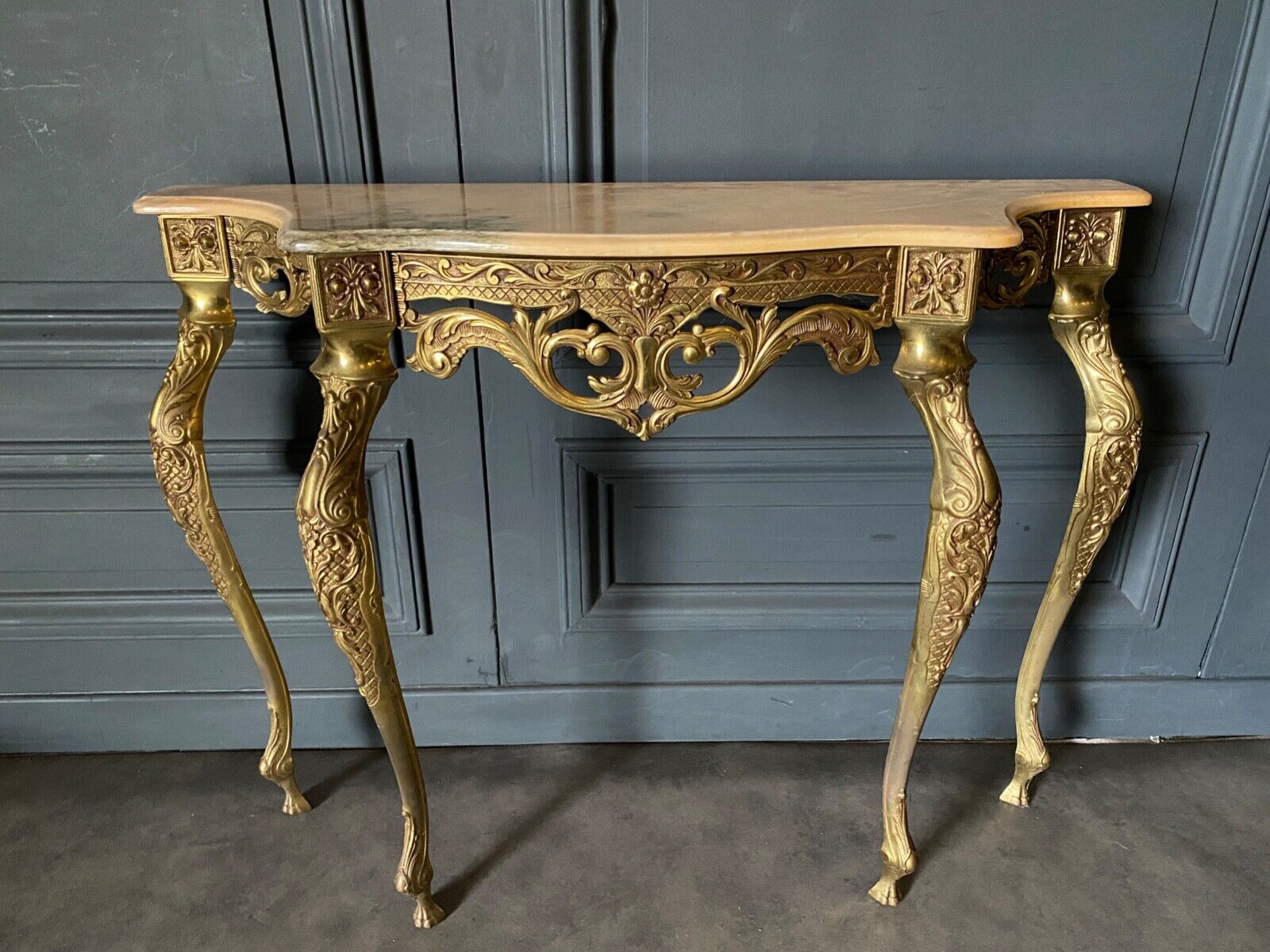 Gilded bronze console Louis XV style and its Mirror Mid-twentieth Marble