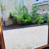 Huge antique Indonesian teak mirror