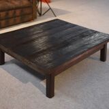 Brutalist coffee table in dark spruce with oak base