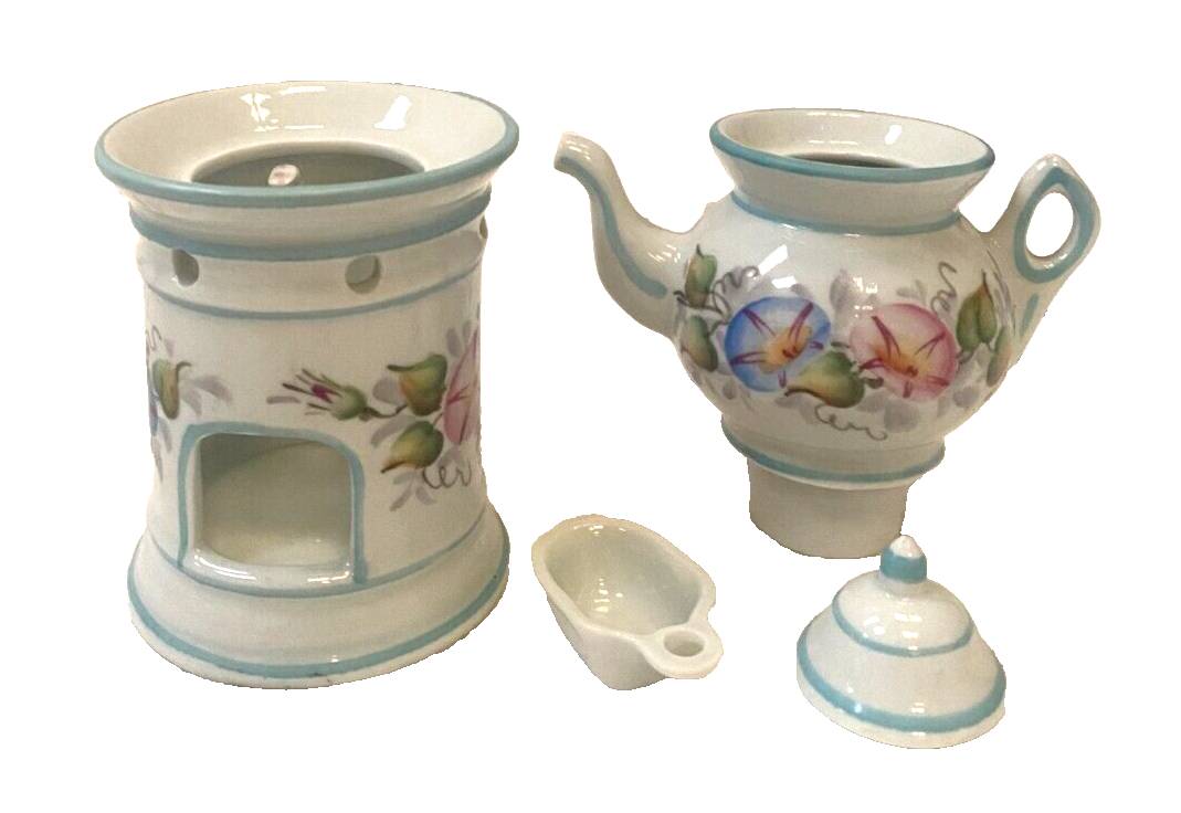 Polychrome porcelain tea pot with 20th century floral decoration