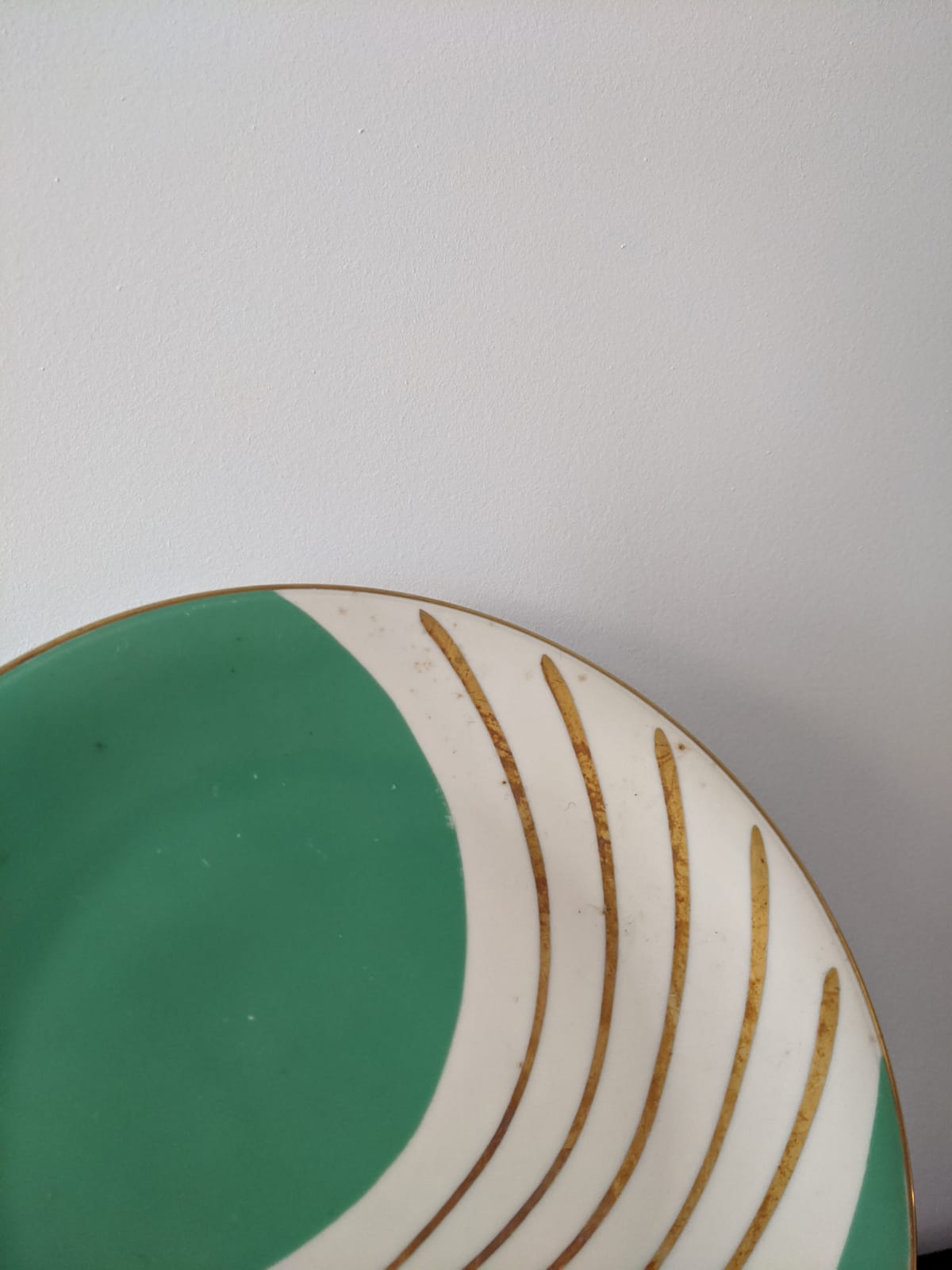 Tea cup and its vintage Art Deco style dessert plate